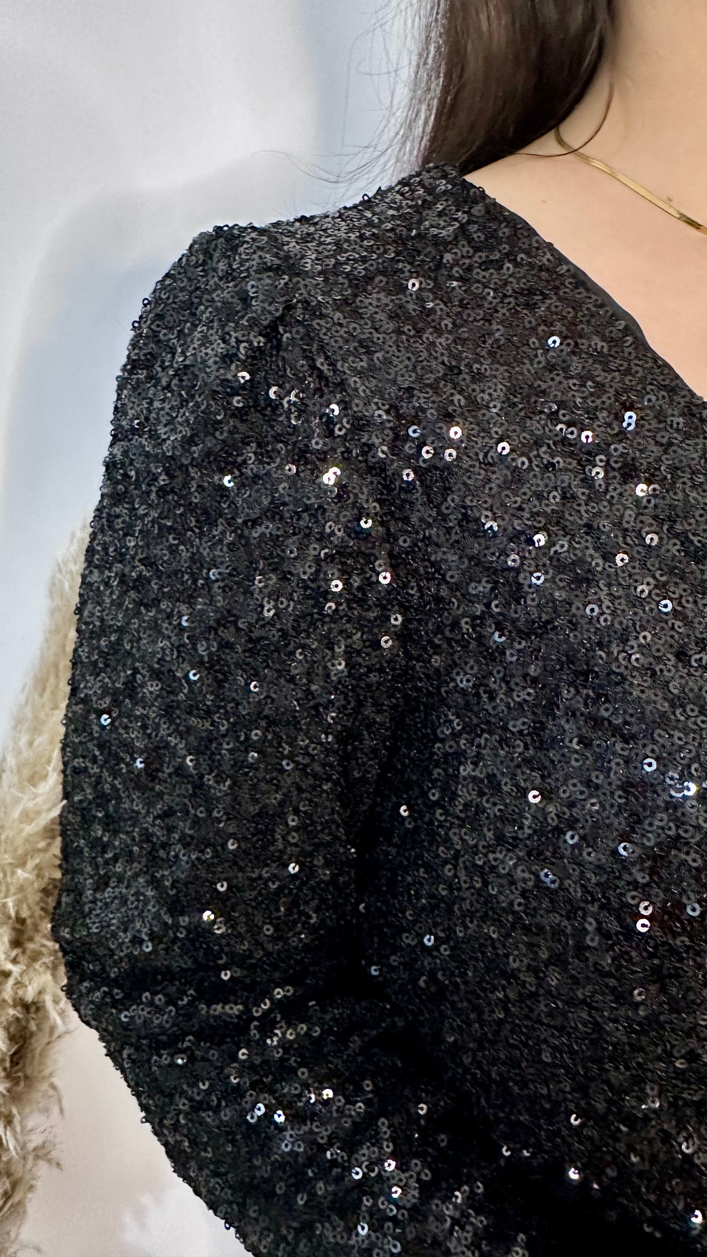 ROBE COURTE EN SEQUINS A DÉFAUT