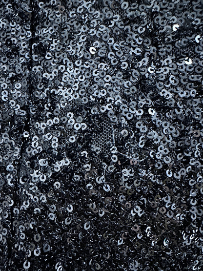ROBE COURTE EN SEQUINS A DÉFAUT